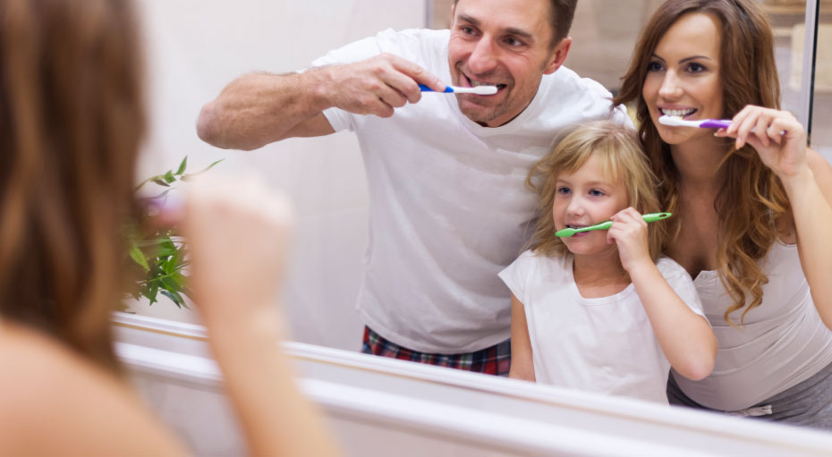 Brushing teeth with the family helps kids develop good habits