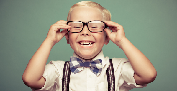 child dressed up in a bowtie and glasses 2