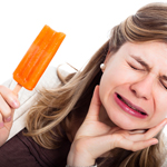 woman eating ice cream in pain 4