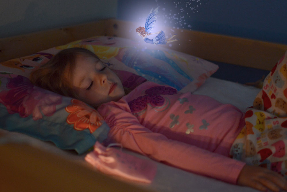 toddler sleeping while tooth fairy comes to visit